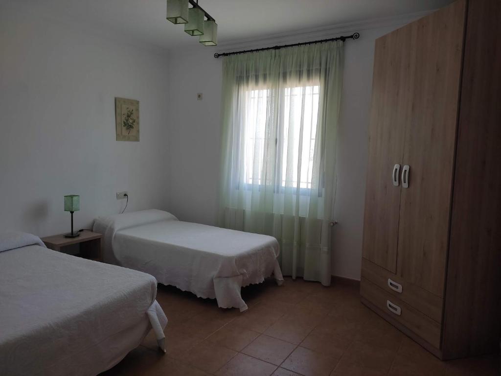 Posteľ alebo postele v izbe v ubytovaní Casas de Madera Los Molinos
