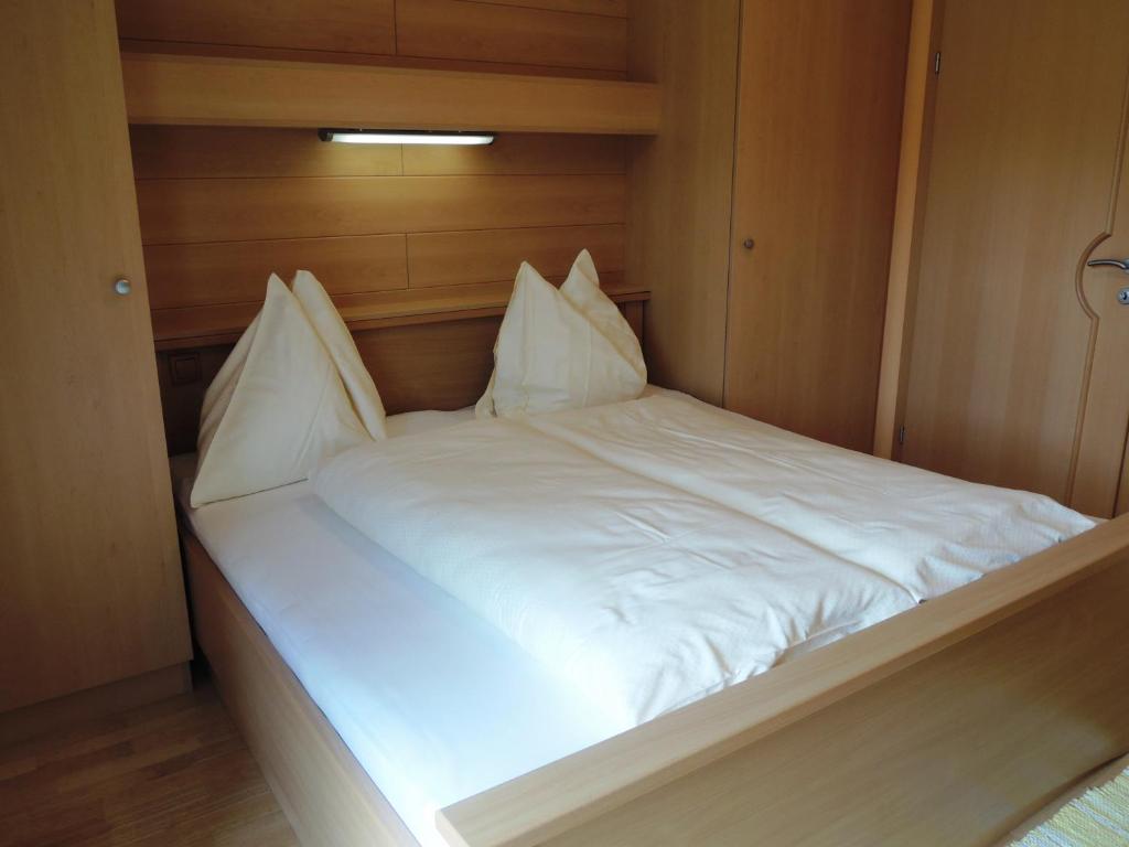 Postel nebo postele na pokoji v ubytování Appartements Edda