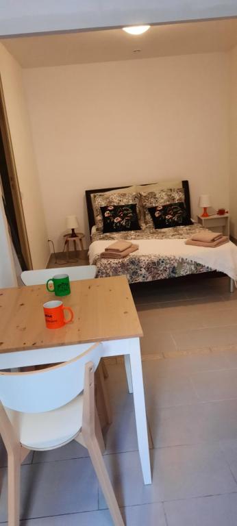Postel nebo postele na pokoji v ubytování Apparemment des moulins