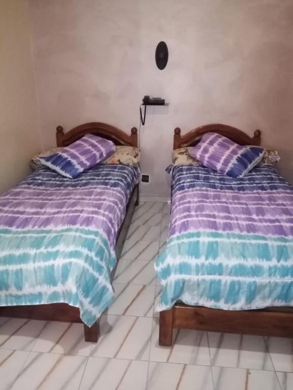 Postel nebo postele na pokoji v ubytování Hotel Aswan
