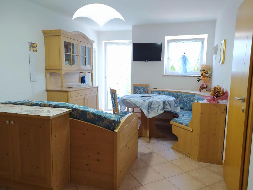 Kuchyň nebo kuchyňský kout v ubytování Paradise Apartments Paganella