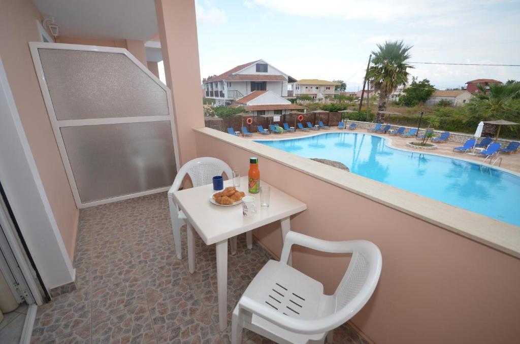 The swimming pool at or close to Anemona Beach apartments