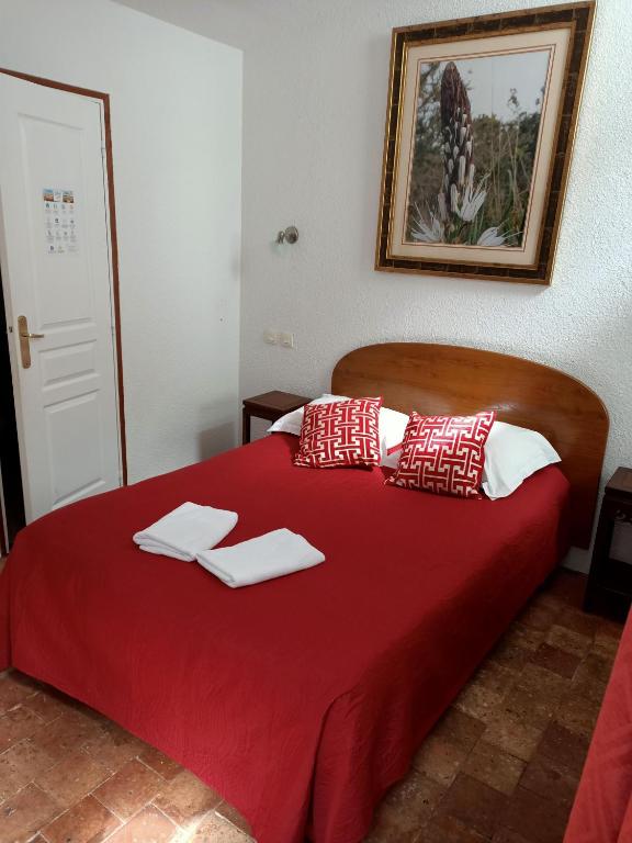 Postel nebo postele na pokoji v ubytování Hotel Saint Amant
