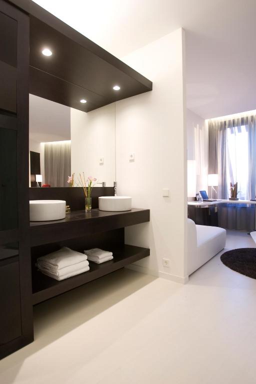 מיטה או מיטות בחדר ב-Hotel Porta Fira 4* Sup