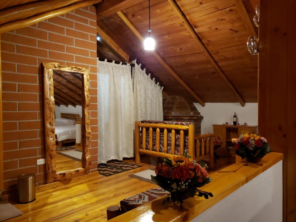 Postel nebo postele na pokoji v ubytování ATALLARO Hospedaje
