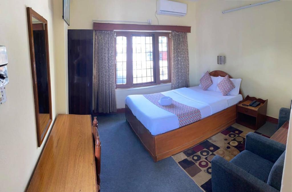 Postel nebo postele na pokoji v ubytování Hotel Blue Magnet