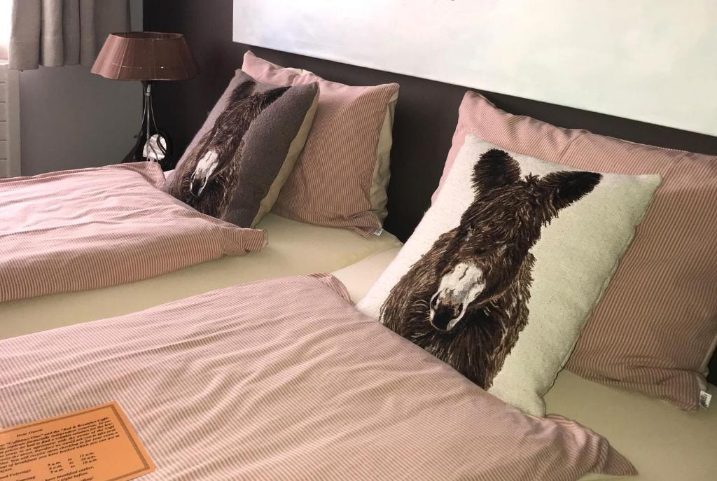 
Ein Bett oder Betten in einem Zimmer der Unterkunft B&B Caffètino-Vino
