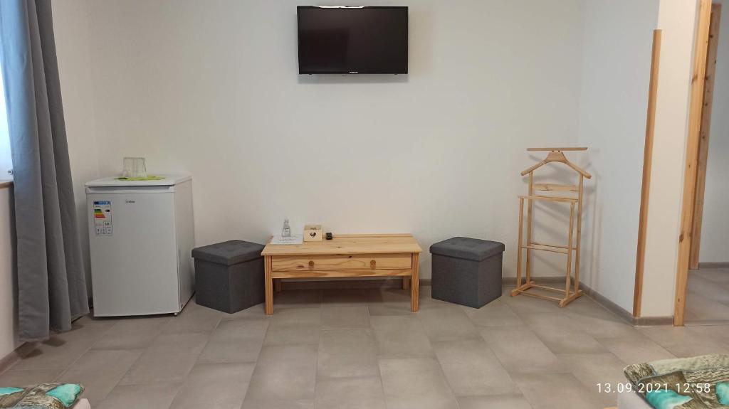 TV a/nebo společenská místnost v ubytování Penzion Forest 2
