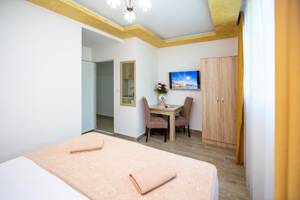Posteľ alebo postele v izbe v ubytovaní Apartment Sofija