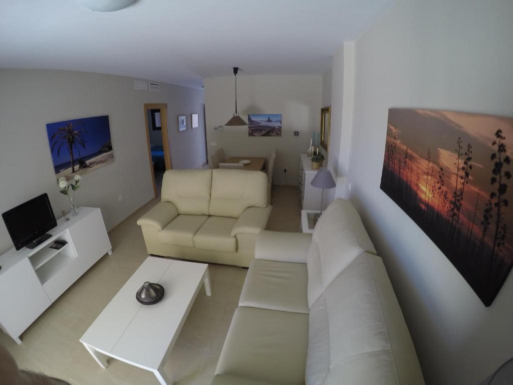 TV a/nebo společenská místnost v ubytování Sotavento 1ª línea de playa