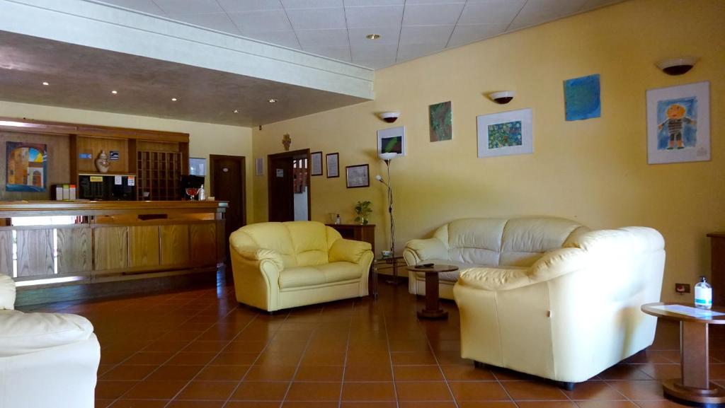 Posezení v ubytování Hotel La Torretta