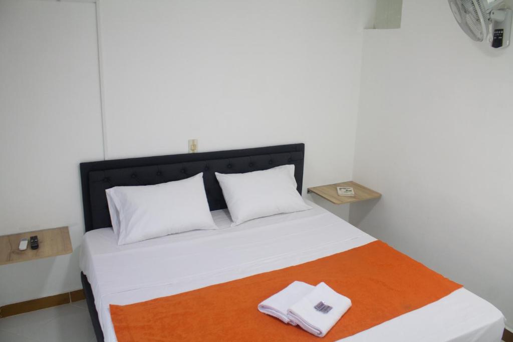 Postel nebo postele na pokoji v ubytování Hotel Picasso 70