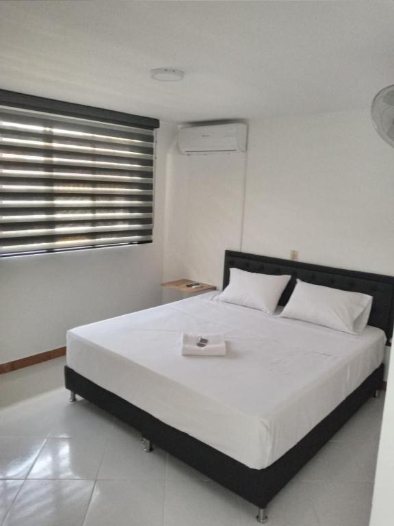 Postel nebo postele na pokoji v ubytování Hotel Picasso 70