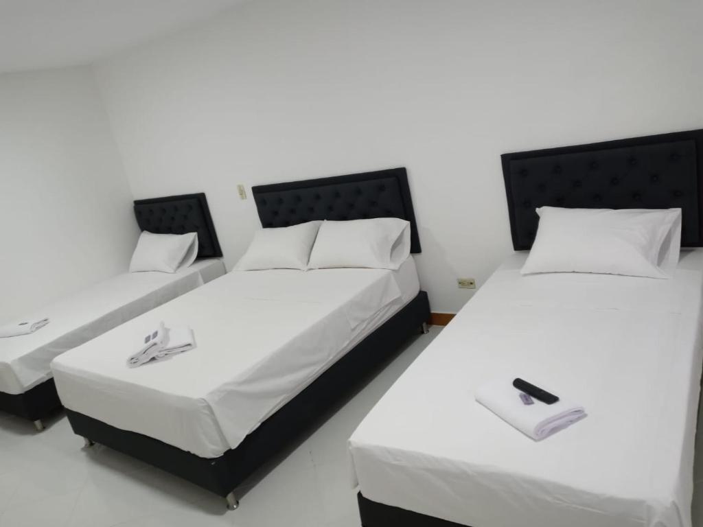 Postel nebo postele na pokoji v ubytování Hotel Picasso 70