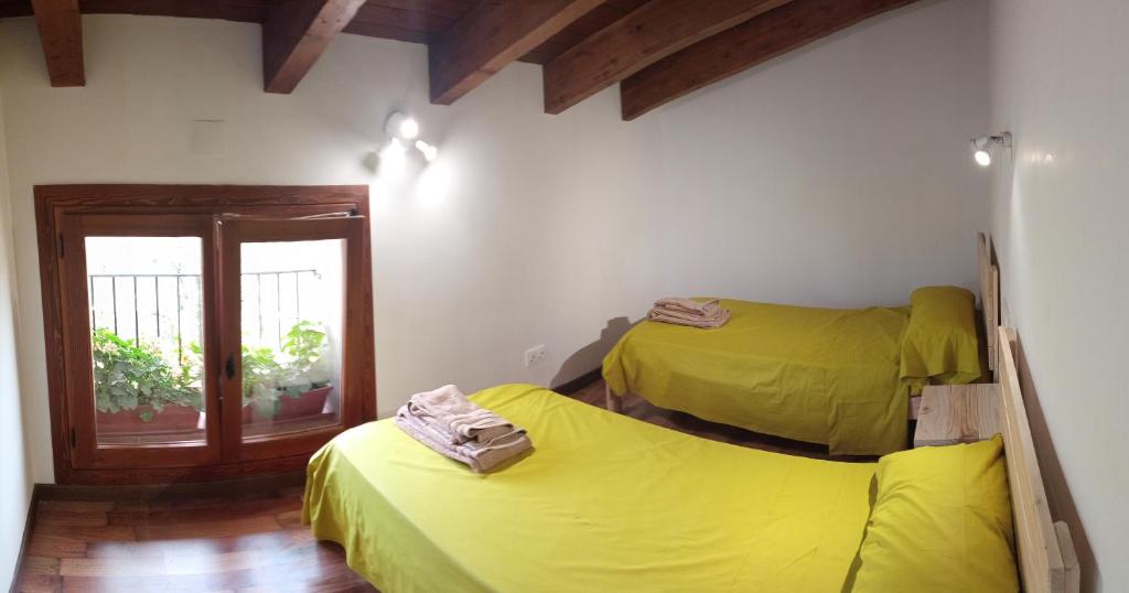 Postel nebo postele na pokoji v ubytování Apartamentos Rurales Rad Icarium