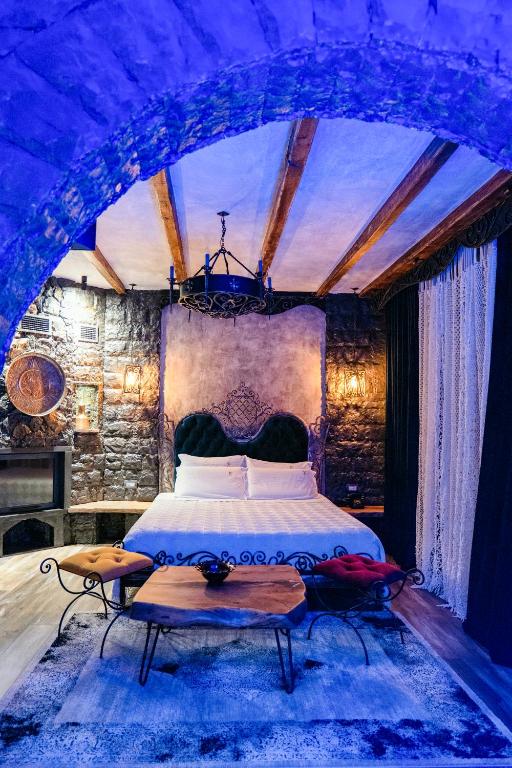 Postel nebo postele na pokoji v ubytování Vila Eden Boutique Hotel