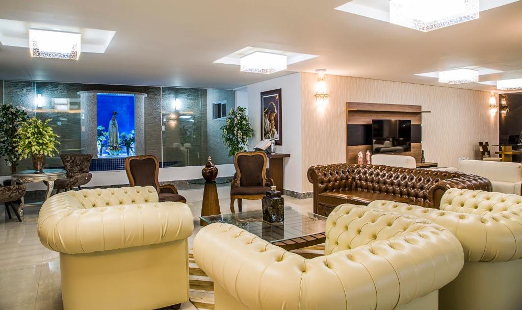 Uma área de estar em Laguna Praia Hotel