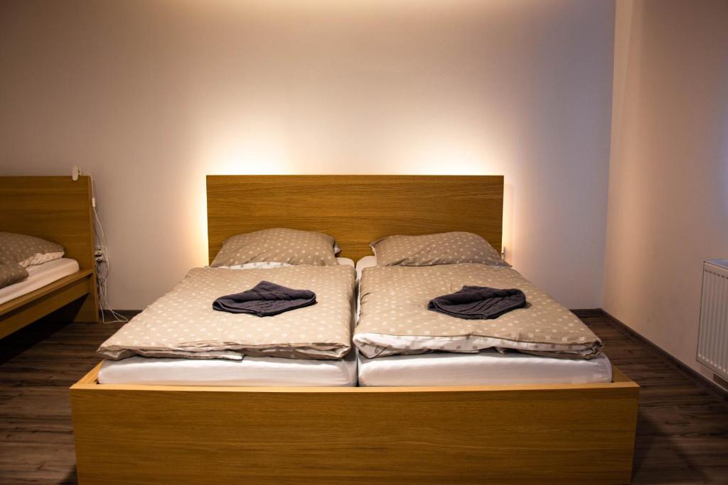 Postel nebo postele na pokoji v ubytování Pardubické boudy