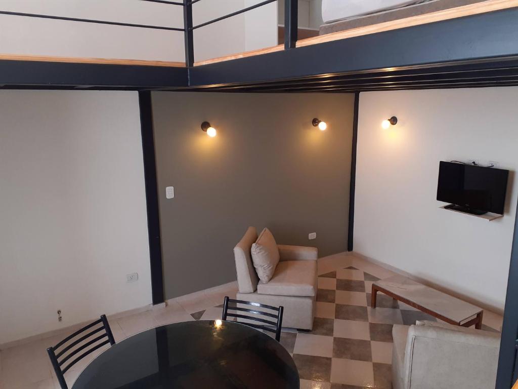 Una televisión o centro de entretenimiento en Bello Jazmin 2