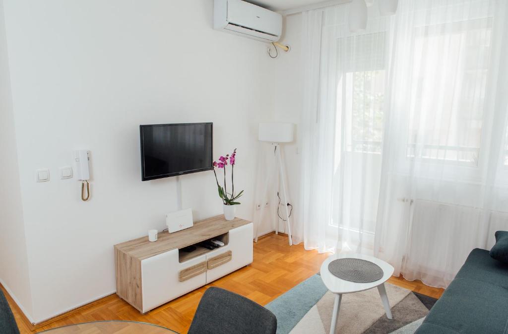 TV a/nebo společenská místnost v ubytování Suite Dreams