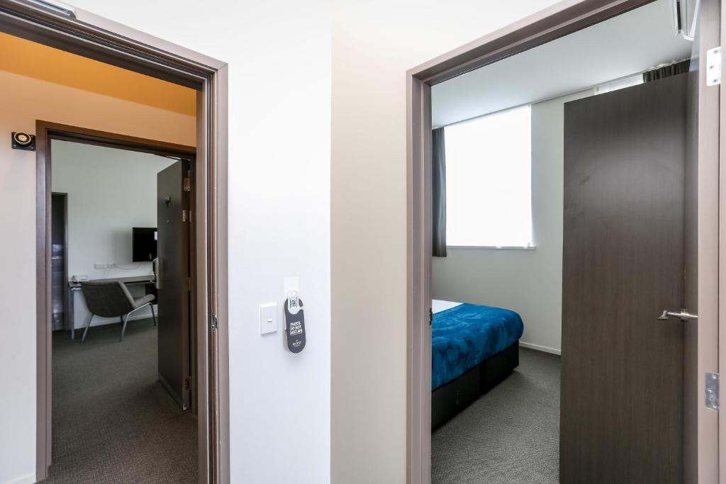 Voodi või voodid majutusasutuse Quest New Plymouth Apartment Hotel toas