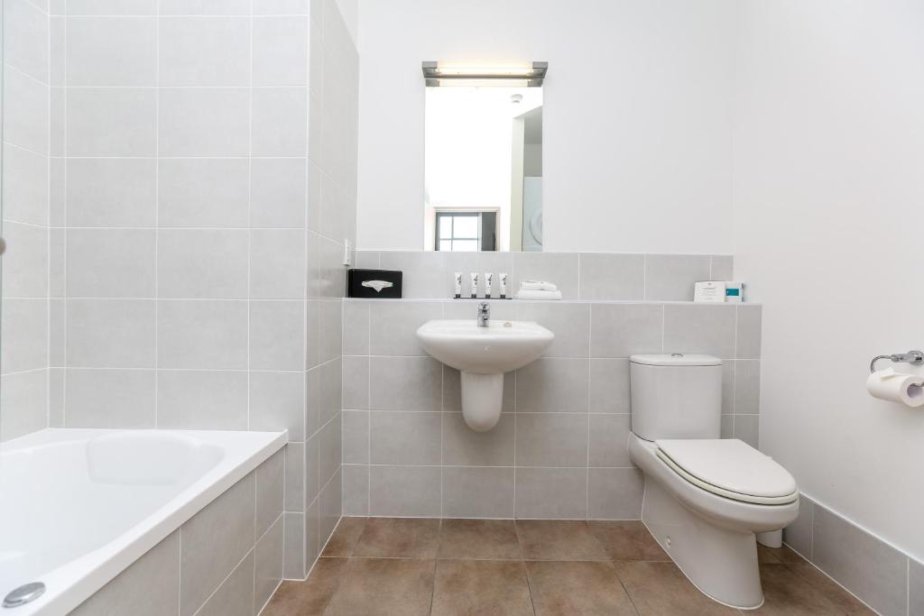Vannituba majutusasutuses Quest New Plymouth Apartment Hotel