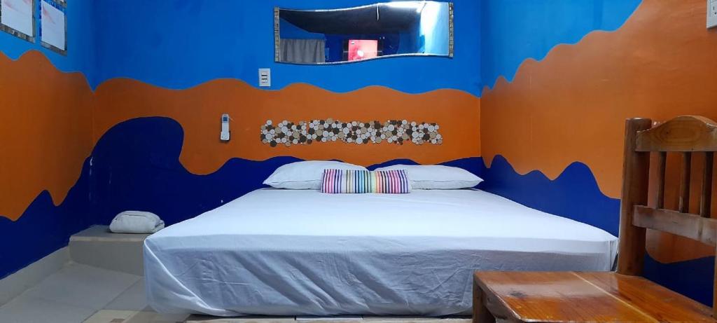 Postel nebo postele na pokoji v ubytování Casa del Jaibo