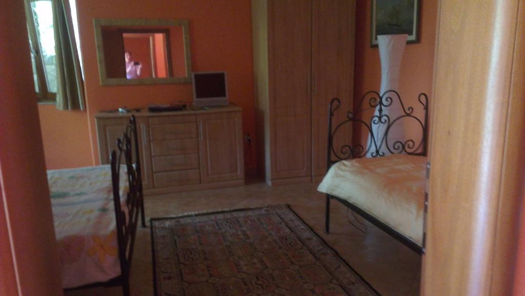 Postel nebo postele na pokoji v ubytování Holiday House Villa Neda