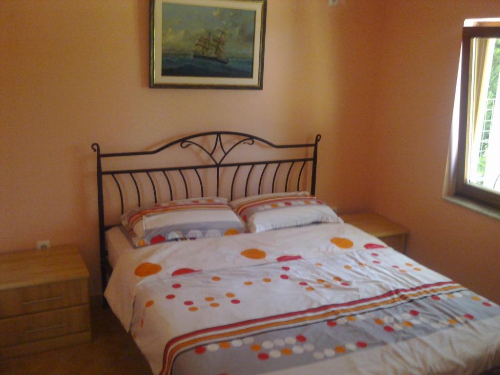 Postel nebo postele na pokoji v ubytování Holiday House Villa Neda