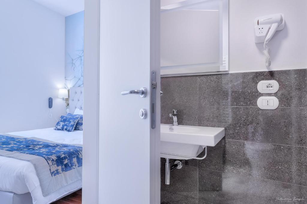 Koupelna v ubytování Hotel Cosmos