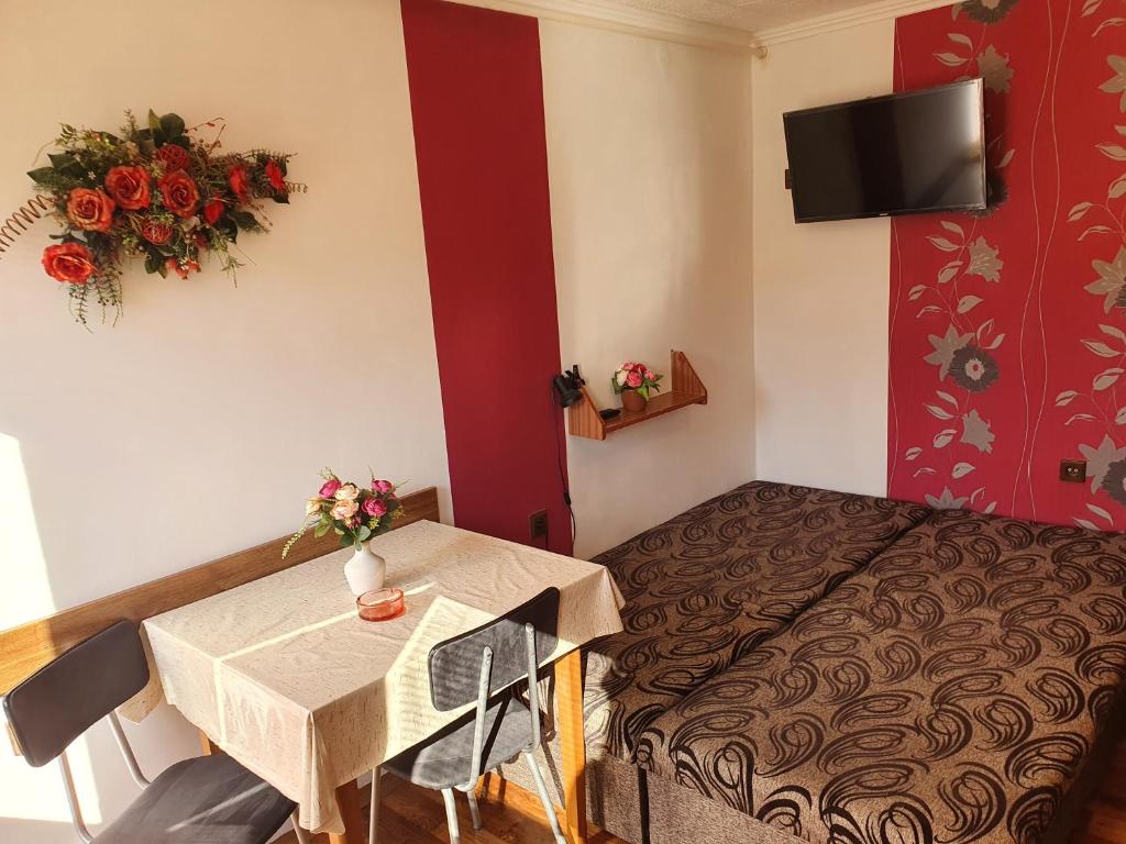 A bed or beds in a room at Privat u Jozefa Földesa