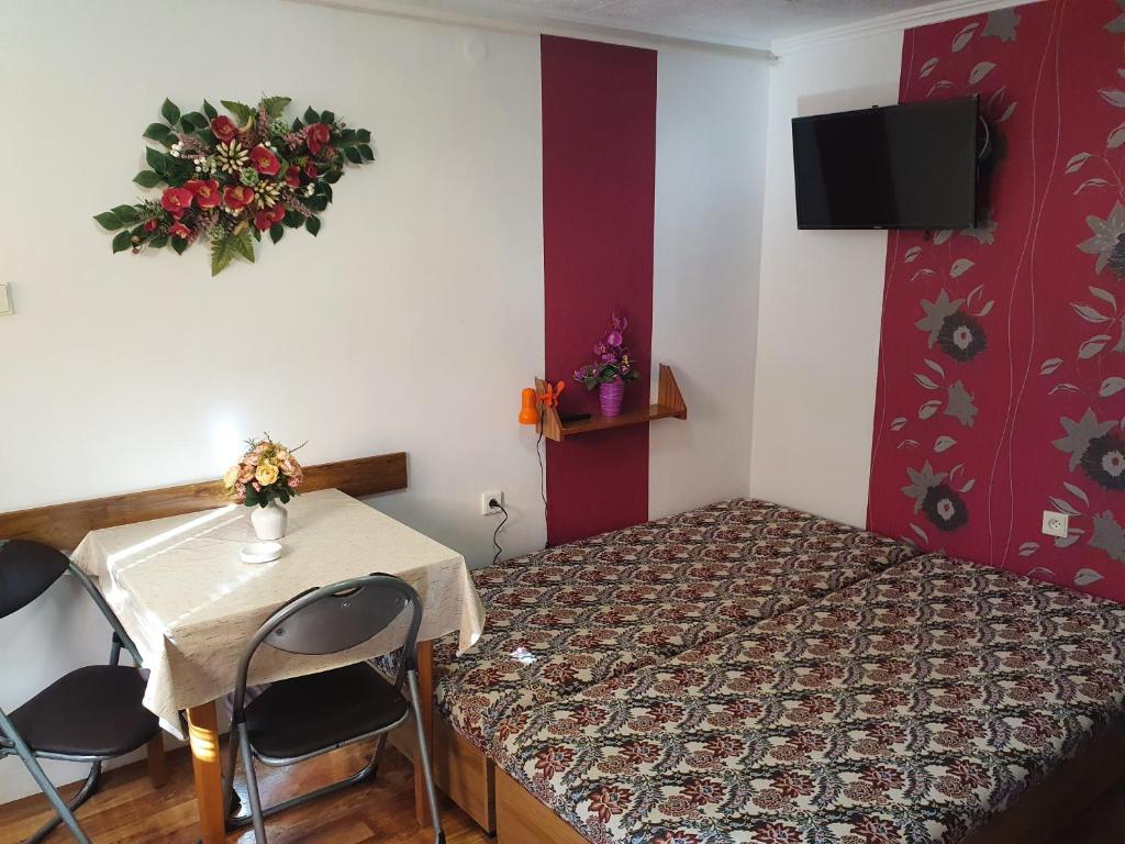 A bed or beds in a room at Privat u Jozefa Földesa