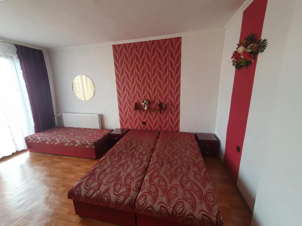 A bed or beds in a room at Privat u Jozefa Földesa