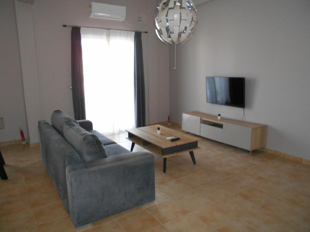 TV a/nebo společenská místnost v ubytování SPΛCES PYLOS Apartments