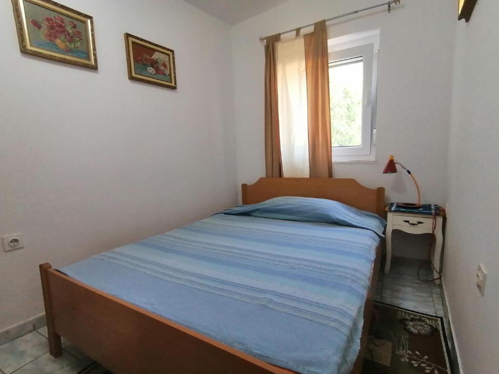 Postel nebo postele na pokoji v ubytování Holiday Apartment Jasna