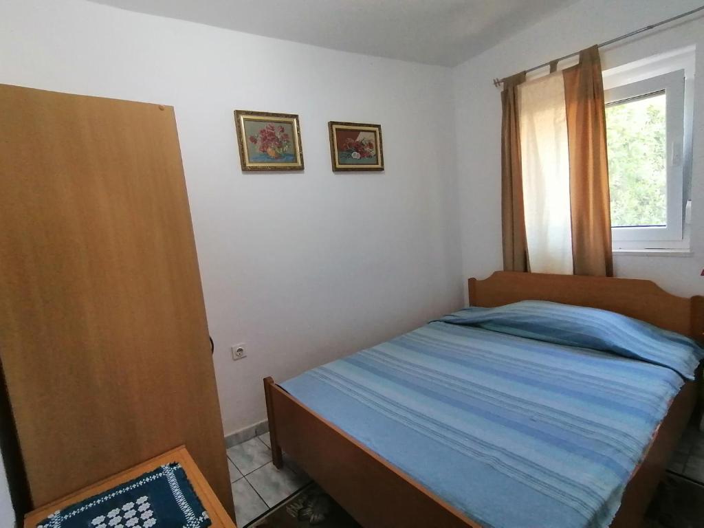 Postel nebo postele na pokoji v ubytování Holiday Apartment Jasna
