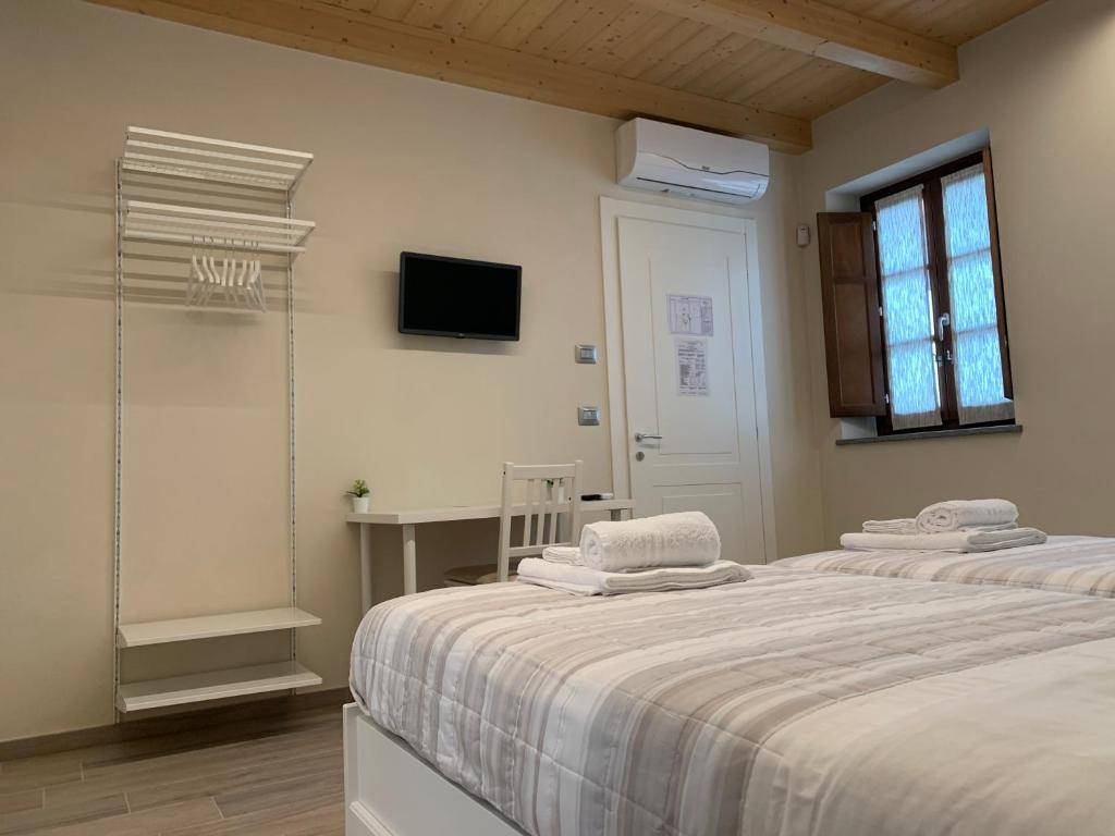 Posteľ alebo postele v izbe v ubytovaní B&B La Luce Verde