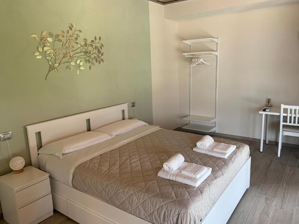 Posteľ alebo postele v izbe v ubytovaní B&B La Luce Verde