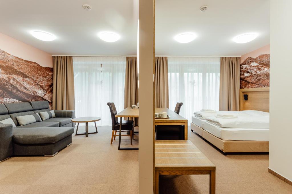 Postel nebo postele na pokoji v ubytování Apartmány Humno
