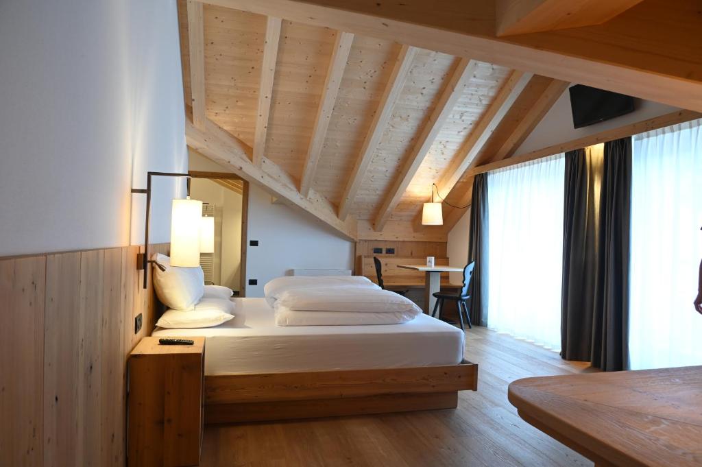 Postel nebo postele na pokoji v ubytování B&B Fontanella
