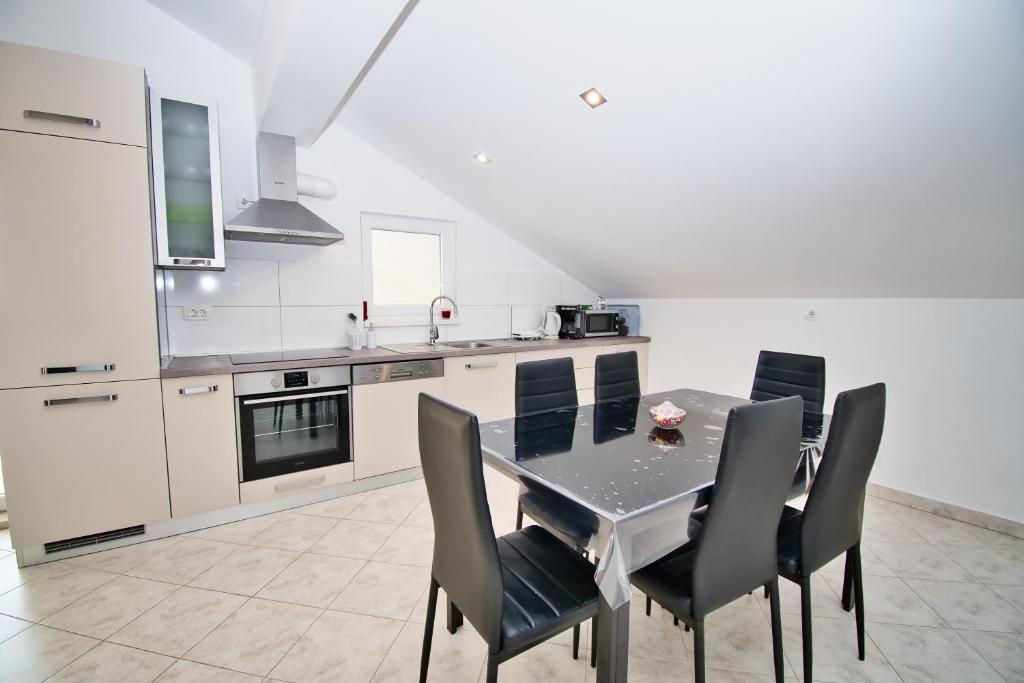 Kuchyň nebo kuchyňský kout v ubytování Apartman ZORKA