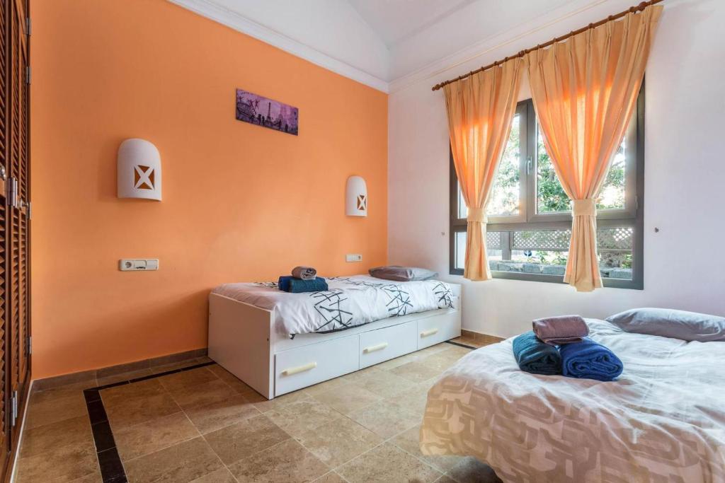 Postel nebo postele na pokoji v ubytování Villa Tania - Villa independiente con piscina privada