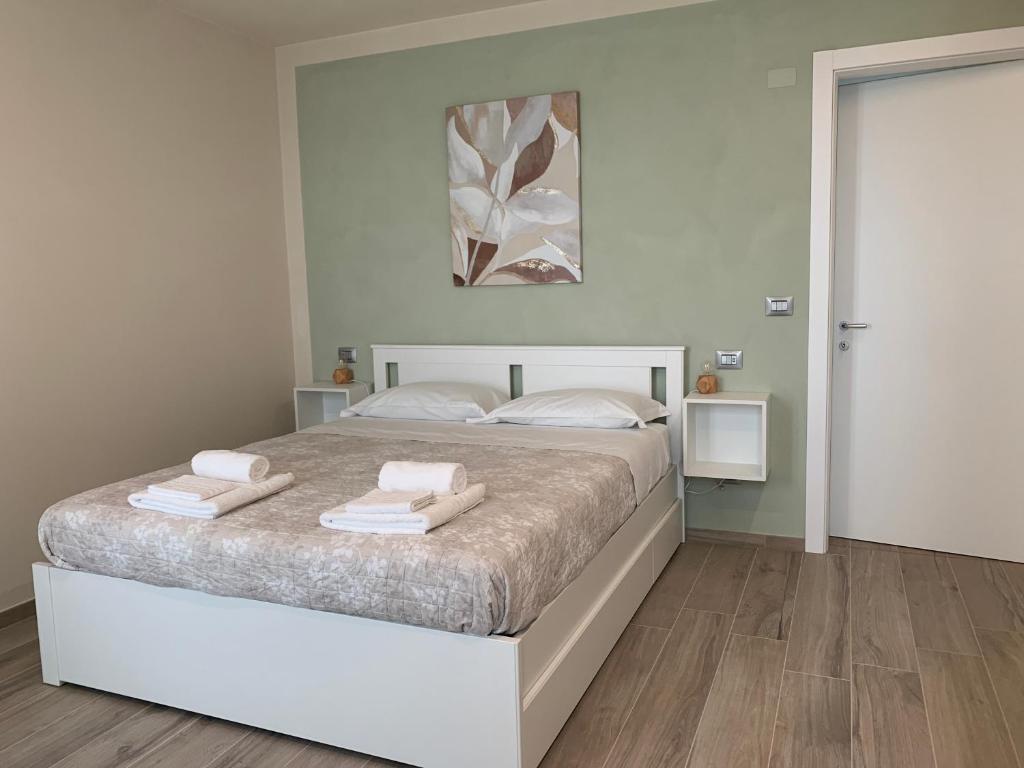 Posteľ alebo postele v izbe v ubytovaní B&B La Luce Verde