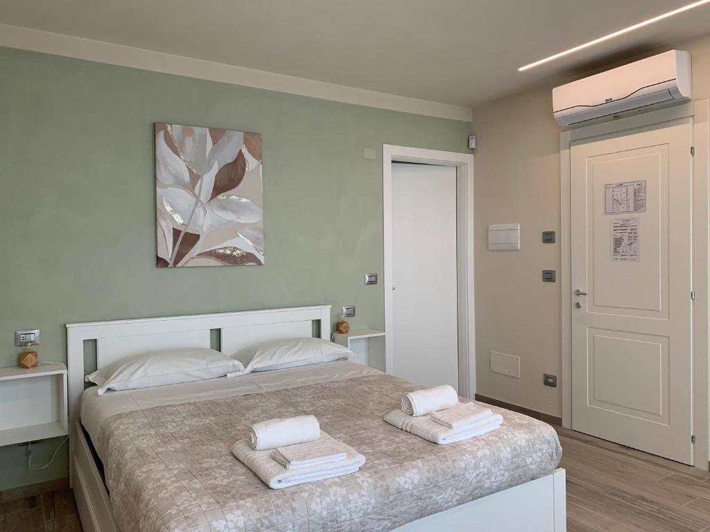 Posteľ alebo postele v izbe v ubytovaní B&B La Luce Verde