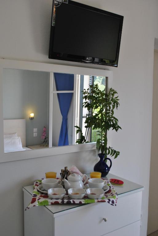 TV a/nebo společenská místnost v ubytování Hotel Helios Splendid