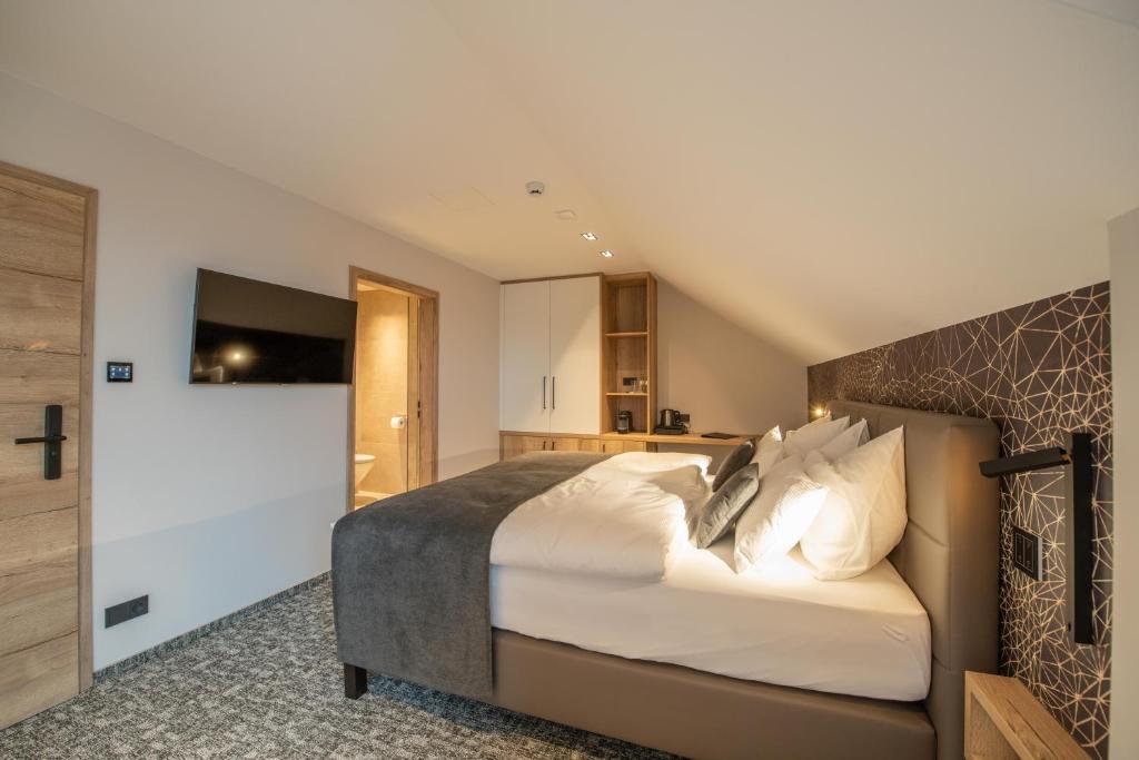 Postel nebo postele na pokoji v ubytování Ohles Lifestyle Guesthouse