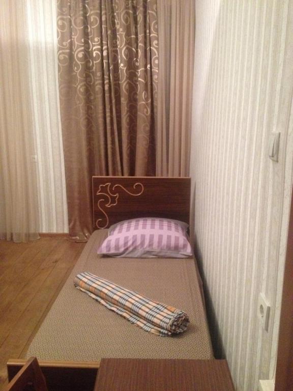 Postel nebo postele na pokoji v ubytování natia