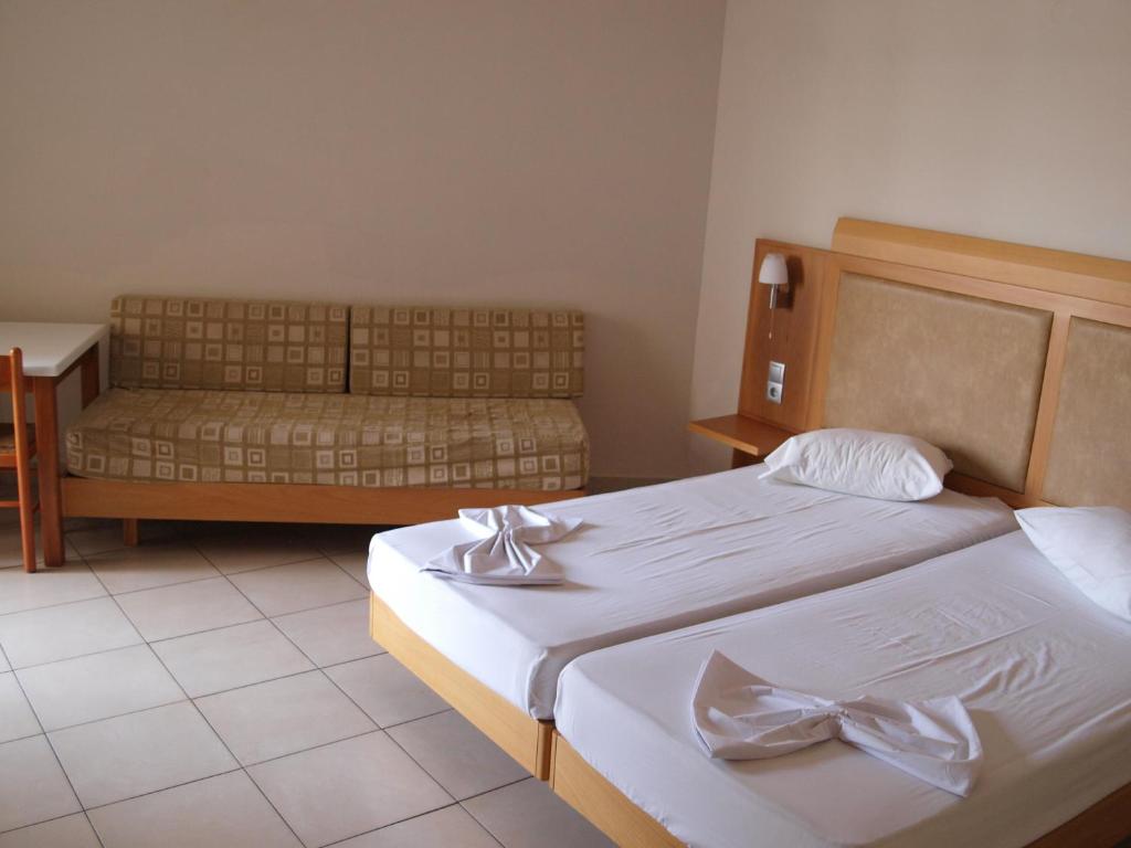 Postel nebo postele na pokoji v ubytování Saint Constantine Hotel