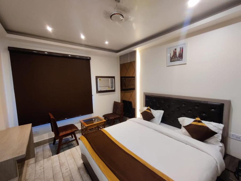 Postel nebo postele na pokoji v ubytování Hotel D SilverLeaf
