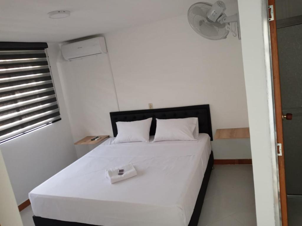 Postel nebo postele na pokoji v ubytování Hotel Picasso 70